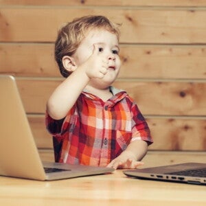 toddler with thumbs up